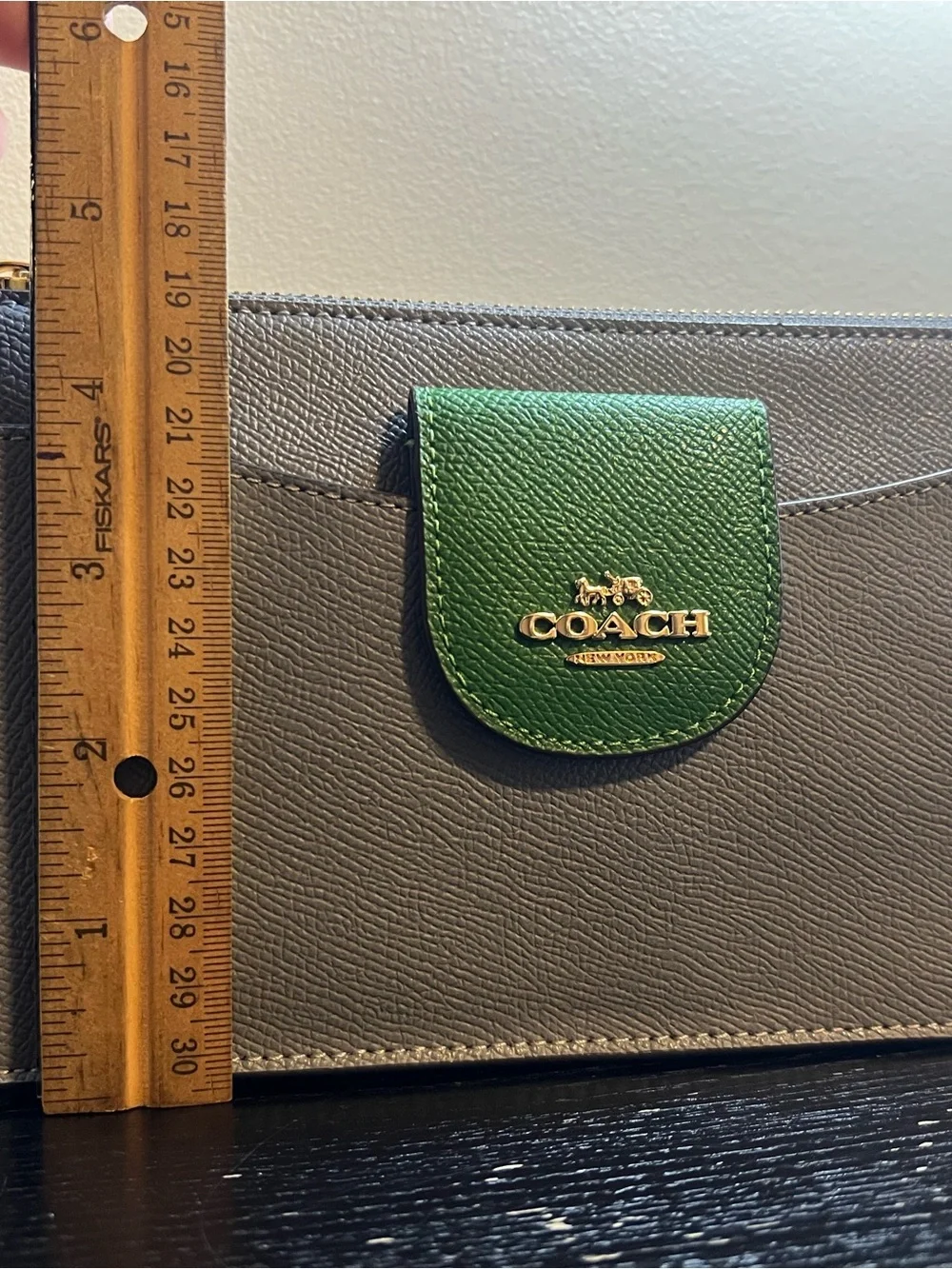 Coach Poppy Crossbody Bag set in a colorblock stone and kelly green